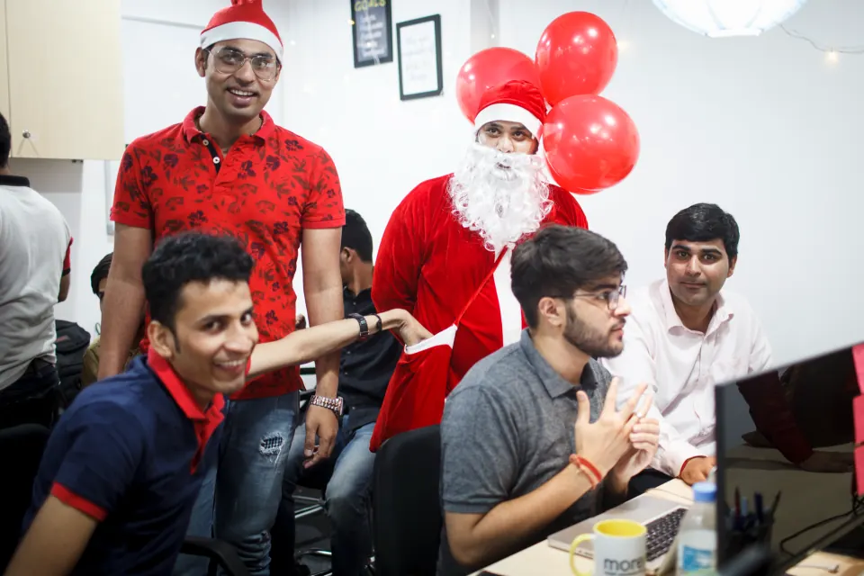 Santa and colleagues at the Christmas celebration