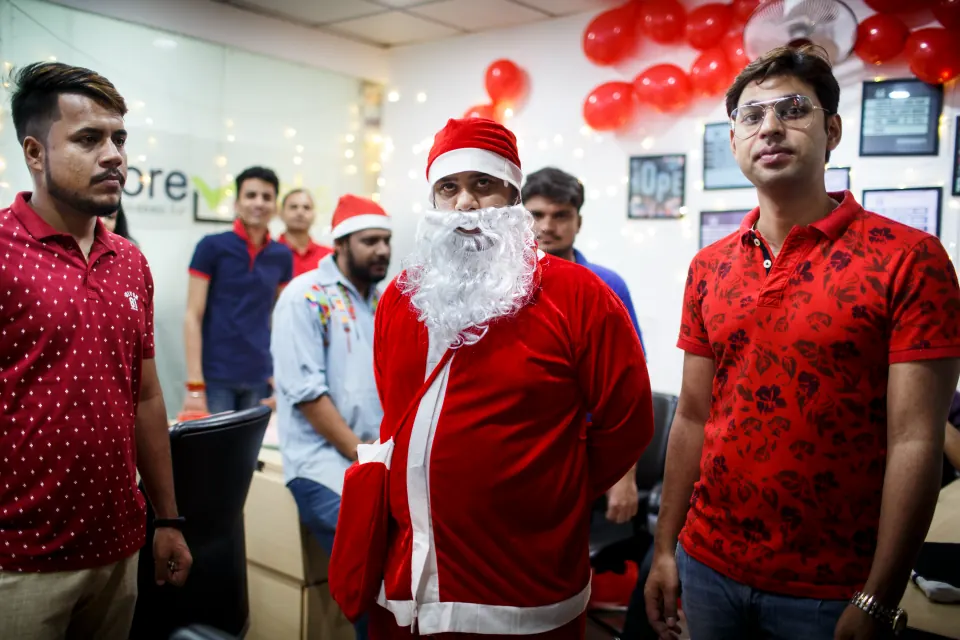 Santa visits the office at Christmas