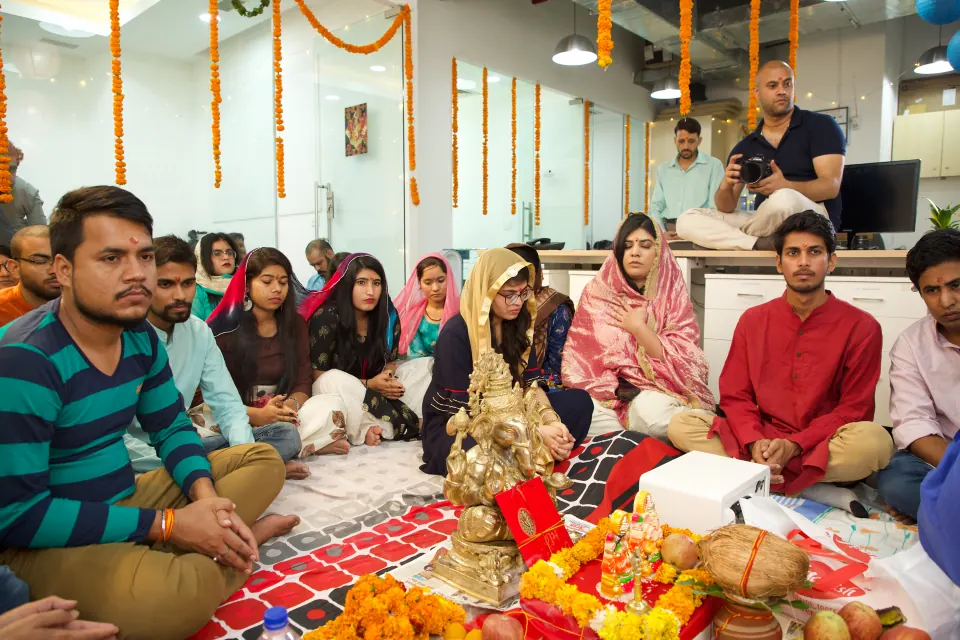 Colleagues at a festive puja