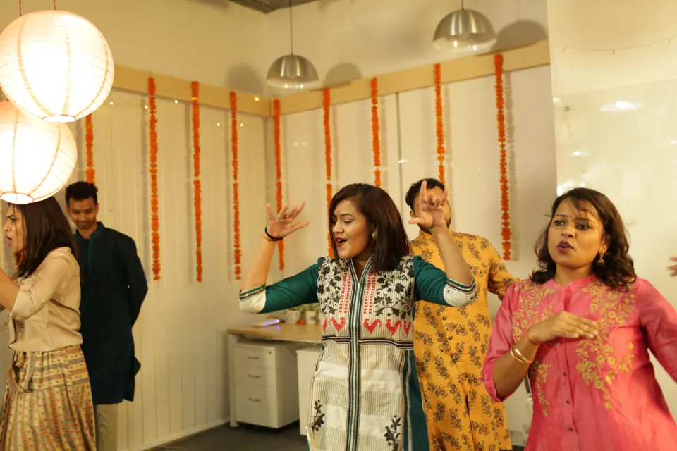 A dance performance at an office celebration