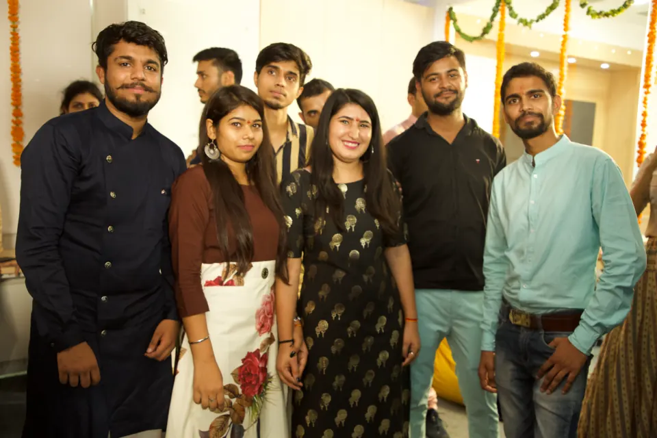Colleagues in festive wear at the office
