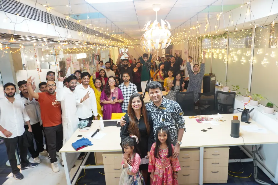 The whole office together at a festive celebration