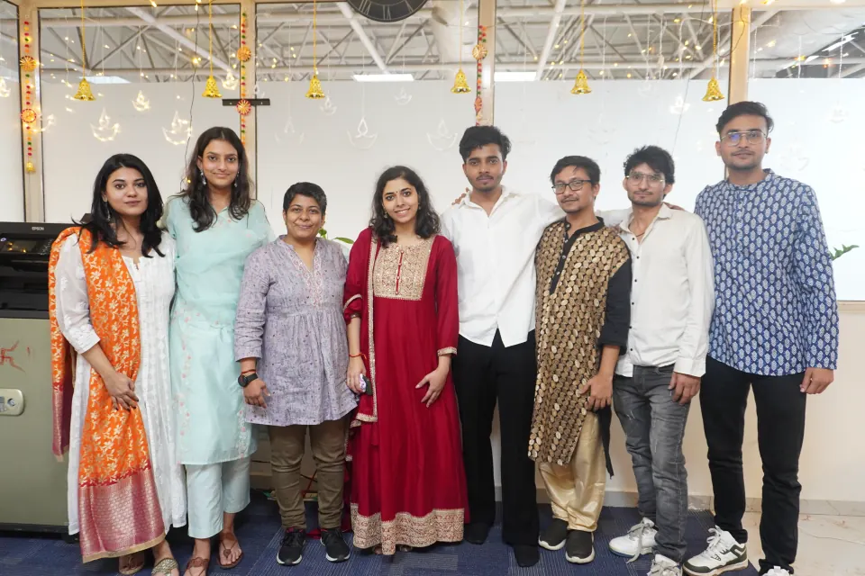Colleagues dressed up for a festive celebration