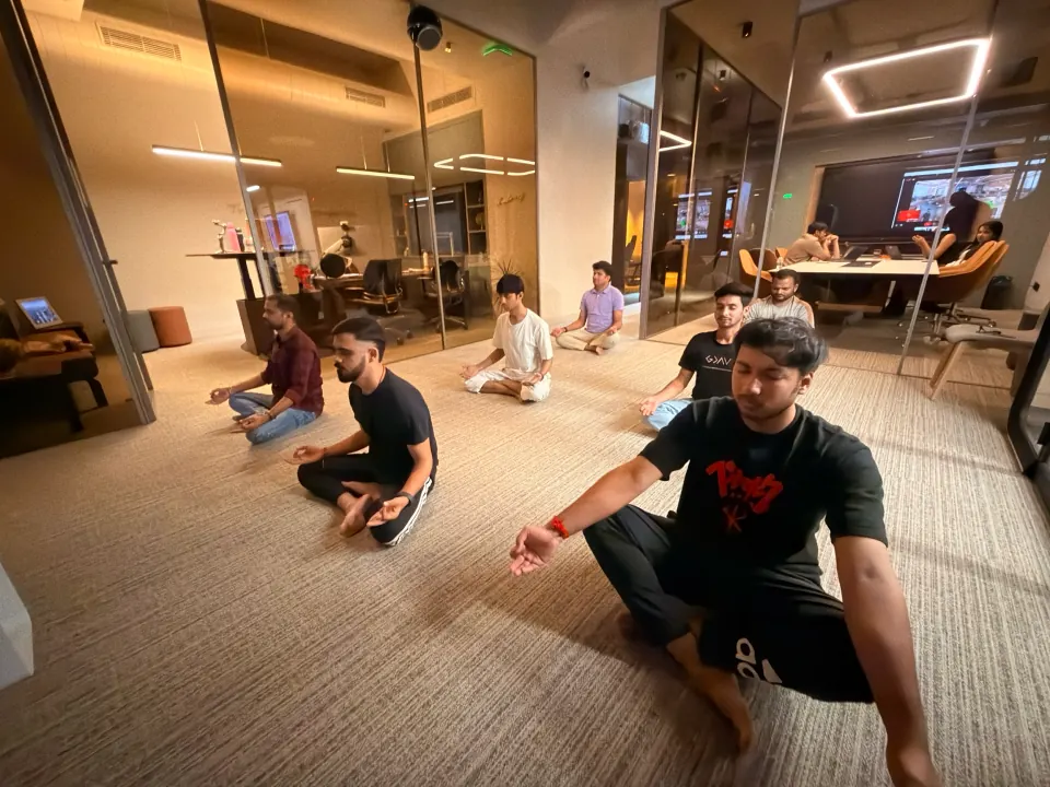 Stretching during an office yoga session