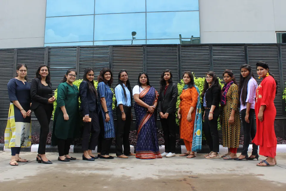 Colleagues in festive wear outside the office