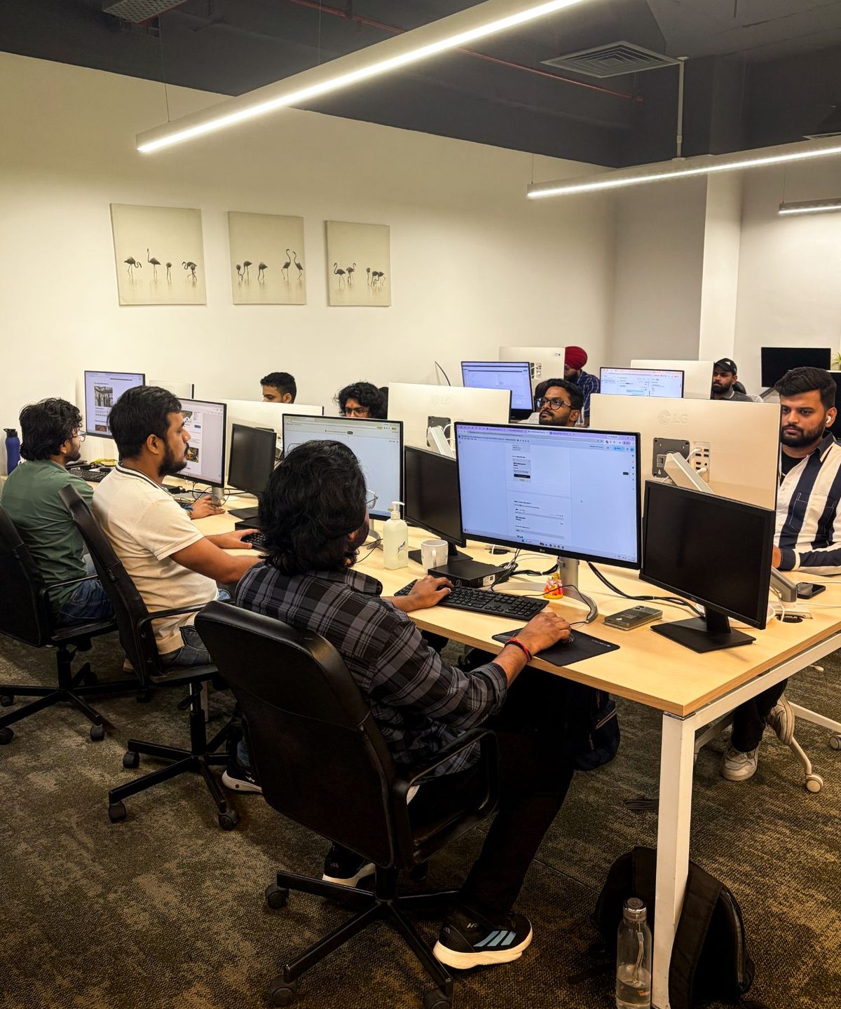 A full floor of MoreTasks colleagues at work